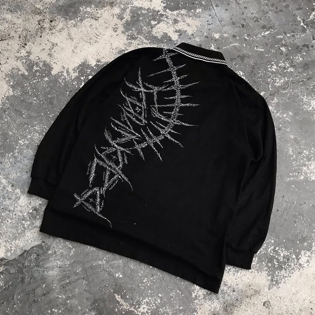 FOUNDED hand-painted polo back detail on concrete